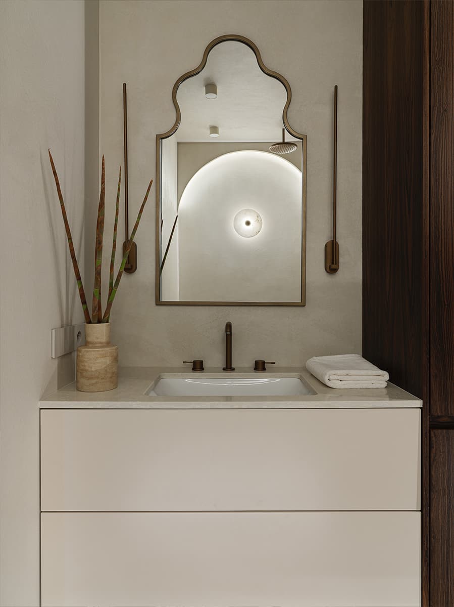 Бархатистая штукатурка и мягкие формы мебели в интерьере квартиры под сдачу в аренду – проект Валерии Дзюбы