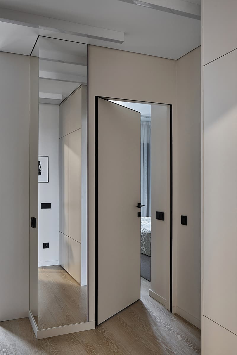 Контраст строгости и теплоты в квартире для программиста — проект студии дизайна интерьеров KIWI