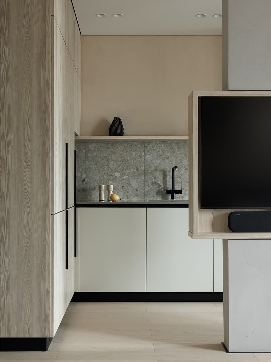 Поворотный телевизор, скрытое хранение и отсылки к джапанди в интерьере для психолога — проект Анны Тюленевой