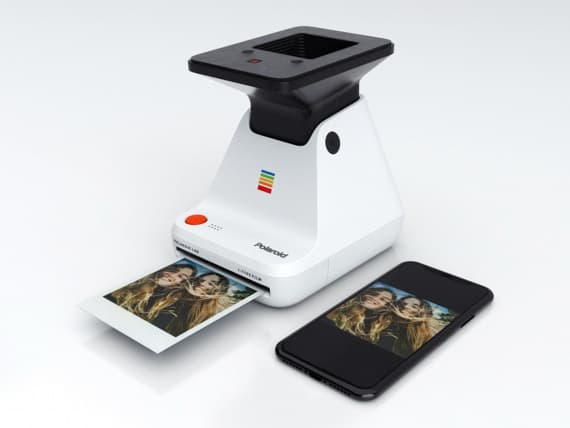Polaroid выпустили миниатюрную фотолабораторию для печати снимков с iPhone Polaroid выпустили миниатюрную фотолабораторию для печати снимков с iPhone